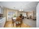 Open-concept living space with kitchen, dining area, and plenty of natural light at 1005 45Th E Ave, Ellenton, FL 34222
