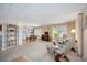 Bright living room flows into dining area, featuring comfortable seating and natural light at 1005 45Th E Ave, Ellenton, FL 34222