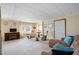 Inviting living room with cozy seating, entertainment center, and neutral décor at 1005 45Th E Ave, Ellenton, FL 34222