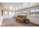 Bright sun room filled with natural light from numerous windows at 1005 45Th E Ave, Ellenton, FL 34222
