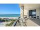 Relaxing balcony with seating and stunning ocean views, perfect for enjoying the coastal breeze at 1241 Gulf Of Mexico Dr # 803, Longboat Key, FL 34228