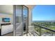 Private balcony offers panoramic views of the city and bay, providing a serene outdoor living space at 1241 Gulf Of Mexico Dr # 803, Longboat Key, FL 34228