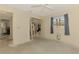 Bedroom with a closet, two windows and a ceiling fan at 1271 Nantucket Rd, Venice, FL 34293