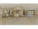 Bright, spacious living area flowing into kitchen and dining, waiting for remodel ideas at 1271 Nantucket Rd, Venice, FL 34293