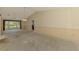 Spacious living room with large windows and natural light at 1271 Nantucket Rd, Venice, FL 34293