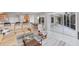 View of living room flowing into the dining area and onto the lanai at 1311 Tuscany Blvd, Venice, FL 34292