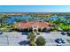 Aerial view of the clubhouse, parking, and surrounding community at 13167 Fernando St, Venice, FL 34293