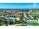 Aerial view of the clubhouse, community pool, and recreational facilities in a Florida neighborhood at 13167 Fernando St, Venice, FL 34293