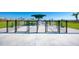 Community dog park featuring separate areas for big and little dogs with gates and lush landscaping at 13167 Fernando St, Venice, FL 34293