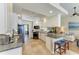 Bright kitchen with granite countertops, stainless steel appliances, and tiled backsplash at 13167 Fernando St, Venice, FL 34293