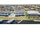 Waterfront home featuring a private boat dock, pool, and screened lanai, ideal for Florida living at 1424 Mediterranean Dr # 112, Punta Gorda, FL 33950