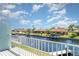 Balcony view of a canal and waterfront homes, offering beautiful scenery and relaxed lifestyle at 1424 Mediterranean Dr # 112, Punta Gorda, FL 33950
