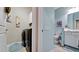 Convenient pass through bathroom next to a laundry area with washer and dryer at 1503 Calle Grand St, Bradenton, FL 34209