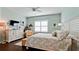 Relaxing bedroom featuring natural light, comfortable seating, and calming decor creating a serene space at 1503 Calle Grand St, Bradenton, FL 34209