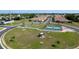 Community recreation area featuring a pickleball court, gazebo, and manicured lawn at 1503 Calle Grand St, Bradenton, FL 34209