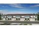 Beautiful townhome featuring a private garage and landscaped front yard at 15164 Cuzcorro Ct, Nokomis, FL 34275