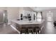 Bright kitchen with long island counter, stainless appliances, and access to living area and backyard at 1606 22Nd W Ave, Palmetto, FL 34221