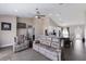 Inviting living area with comfortable seating, recessed lighting, and seamless transition to kitchen and dining areas at 1606 22Nd W Ave, Palmetto, FL 34221