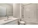 Bright bathroom featuring a tub, a shower, and a white vanity offering a clean and modern look at 17119 Barnwood Pl, Bradenton, FL 34211