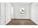 Bright bedroom with hardwood floors and large window with exterior view at 17927 Palmiste Dr, Bradenton, FL 34202