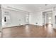 Bright living room with hardwood floors, recessed lighting, and large windows offering natural light and backyard views at 17927 Palmiste Dr, Bradenton, FL 34202