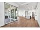 Open floor plan with hardwood floors, sliding glass doors and recessed lighting throughout at 17927 Palmiste Dr, Bradenton, FL 34202