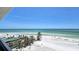 Aerial view showing the beach, ocean, and beachfront property at 20 Whispering Sands Dr # 1201, Sarasota, FL 34242
