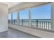 Condo balcony boasts endless ocean views and access to soft sandy beach below at 20 Whispering Sands Dr # 1201, Sarasota, FL 34242
