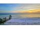 Wonderful beach sunset with the sun kissing the ocean waves and beautiful sky at 20 Whispering Sands Dr # 1201, Sarasota, FL 34242