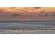 Calm ocean view during twilight at 20 Whispering Sands Dr # 1201, Sarasota, FL 34242