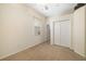 Neutral bedroom featuring ceiling fan, neutral carpet, double closet, and window with blinds at 224 Dahlia Ct, Bradenton, FL 34212