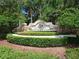 Landscaped entryway sign that reads: 'Greyhawk Landing' at 224 Dahlia Ct, Bradenton, FL 34212