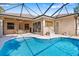 The pool area features a refreshing pool and an open-air dining area at 224 Dahlia Ct, Bradenton, FL 34212