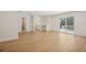 Spacious bedroom featuring hardwood floors, a sliding glass door, and ample natural light at 2655 Bay St, Sarasota, FL 34237
