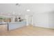 Bright and airy kitchen space with an island, stainless appliances, and an open floor plan at 2655 Bay St, Sarasota, FL 34237