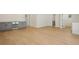 Bright living room featuring hardwood floors and a built-in beverage cooler at 2655 Bay St, Sarasota, FL 34237