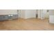 Spacious living area features new hardwood floors, modern cabinets and wine cooler at 2655 Bay St, Sarasota, FL 34237