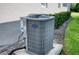 Exterior shot of Carrier branded home air conditioning unit at 2945 Trustee Ave, Sarasota, FL 34243