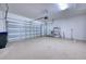 Clean garage with epoxy flooring, automatic door opener, and great space for storage at 2945 Trustee Ave, Sarasota, FL 34243