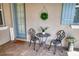 Cozy front porch with seating, a welcome sign, and decorative accents offering a warm invitation at 2945 Trustee Ave, Sarasota, FL 34243