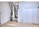 Utility room with A/C unit, water heater, and built in closets for storage at 2945 Trustee Ave, Sarasota, FL 34243