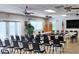 Community center meeting room features ample seating and natural light at 3002 Sail Pointe Cir # 1B, Venice, FL 34293