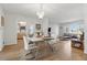 Open dining area adjacent to the kitchen and living room, perfect for entertaining guests at 3105 Gulfgate Dr, Sarasota, FL 34231