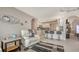 Open living area with access to the kitchen, offering a comfortable and modern living space at 4037 Wooley Ave, North Port, FL 34287