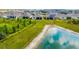 A backyard view featuring a serene lake, enhancing the property's appeal with natural beauty and privacy at 4119 Mossy Limb Ct, Palmetto, FL 34221