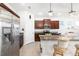 Modern kitchen with granite countertops and stainless steel appliances at 4119 Mossy Limb Ct, Palmetto, FL 34221