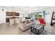 Open floor plan featuring the living room, kitchen, dining nook, and modern décor at 4119 Mossy Limb Ct, Palmetto, FL 34221