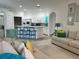 Open-concept living space connecting the kitchen and living room with a seamless flow and inviting atmosphere at 4217 N Chamberlain E Blvd, North Port, FL 34286