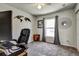 Bedroom with carpet, a ceiling fan, work space and natural light from a window at 4542 19Th S Ave, St Petersburg, FL 33711