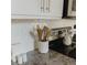Modern kitchen features granite countertops, white subway tile, and stainless appliances at 4549 Mcintosh Ln, Sarasota, FL 34232